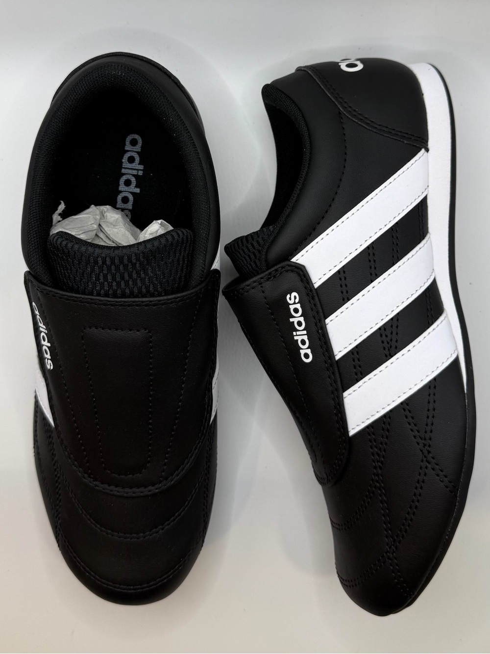 adidas Black and White Three-Stripe Slip-On Sneakers